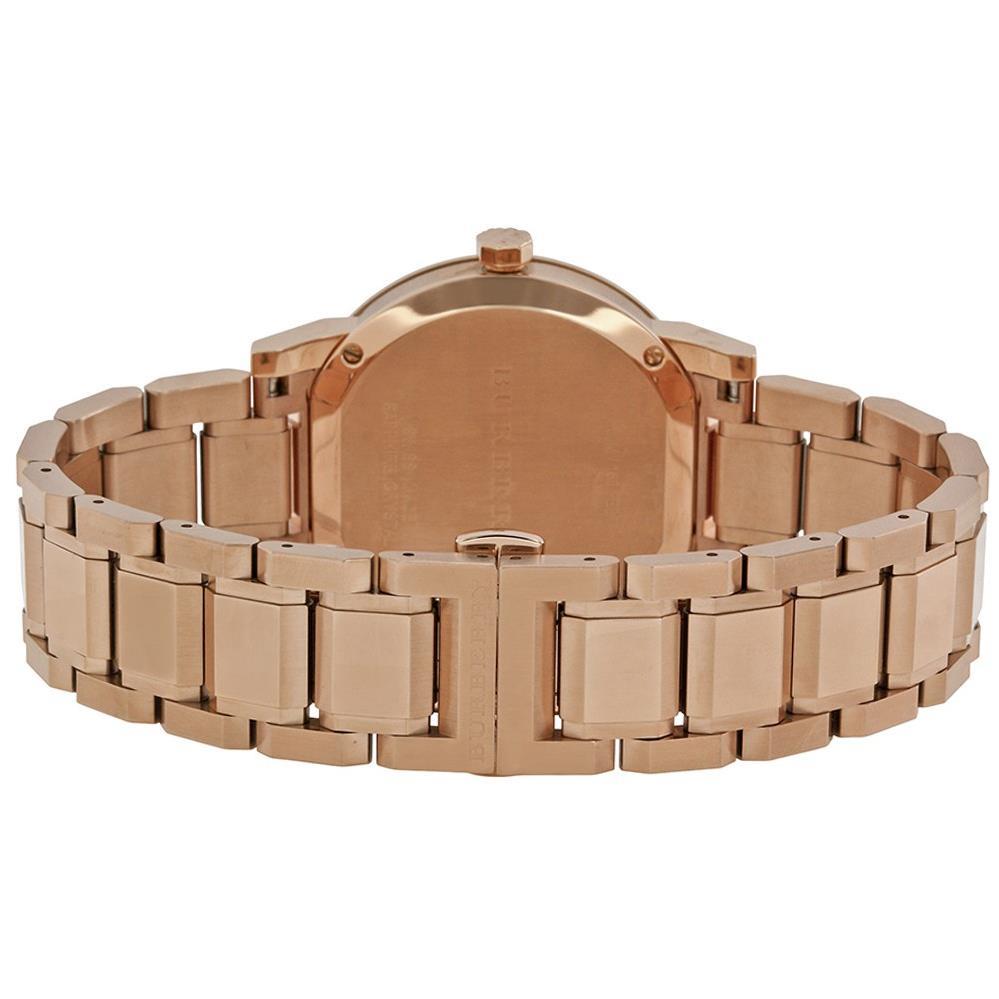 Burberry BU9034 Damen Uhr mit rosafarbenem Zifferblattund roségoldenem Ton Burberry BU9034 Damen Uhr mit rosafarbenem Zifferblattund roségoldenem Ton